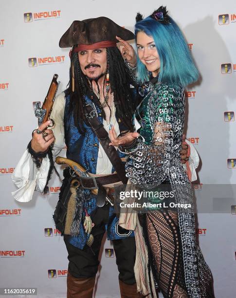 Captain Jack Sparrow and guest attend InfoList Pre-Comic-Con Bash at Wisdome Immersive Art Park on July 11, 2019 in Los Angeles, California.