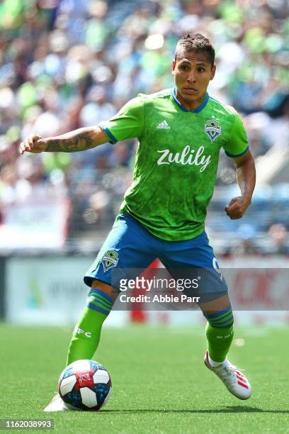 Raul Ruidiaz of Seattle Sounders dribbles with the ball in the first half against the Atlanta United during their game at CenturyLink Field on July...