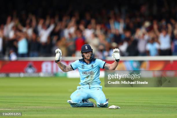 Ben Stokes of England reacts after an attempted run out results in four overthrows after riqocheting off his bat during the Final of the ICC Cricket...