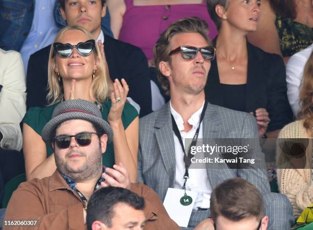 Poppy Delevingne and James Cook attend Men's Finals Day of the Wimbledon Tennis Championships at All England Lawn Tennis and Croquet Club on July 14,...