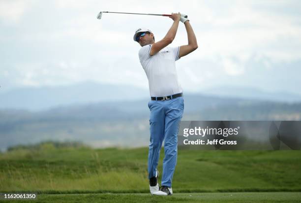 Scott Harrington plays his tee shot on the 14th hole during the final round of the Korn Ferry Tour TPC Colorado Championship at TPC Colorado on July...