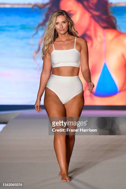 Clarissa Bowers walks the runway during the 2019 Sports Illustrated Swimsuit Runway Show During Miami Swim Week At W South Beach - Runway at WET...