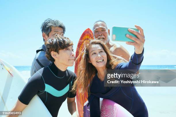Senior Surfers taking selfies