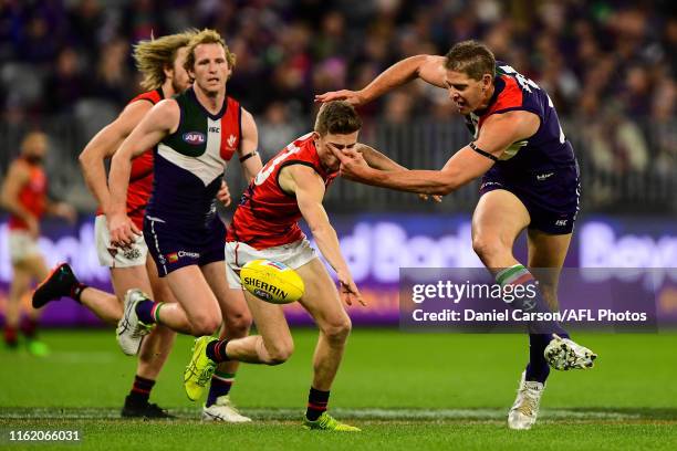 Brayden Ham of the Bombers has his eye poked by Aaron Sandilands of the Dockers during the 2019 AFL round 22 match between the Fremantle Dockers and...