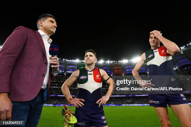 Hayden Ballantyne and Aaron Sandilands of the Dockers is interviewed after the match during the 2019 AFL round 22 match between the Fremantle Dockers...