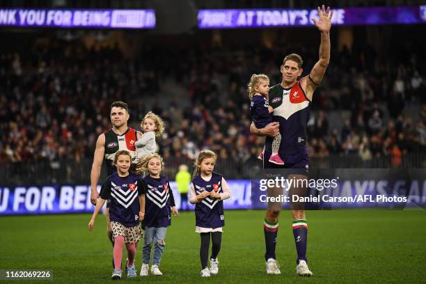 Hayden Ballantyne and Aaron Sandilands of the Dockers thanks the fans on their lap of honour during the 2019 AFL round 22 match between the Fremantle...