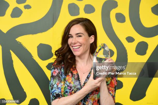 Actress Halina Reijn poses with Variety Piazza Grande Award during the 72nd Locarno Film Festival on August 17, 2019 in Locarno, Switzerland.