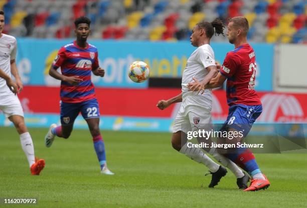 Caniggia Ginola Elva of Ingolstadt and Jan Kirchhoff of Uerdingen compete during the 3. Liga match between KFC Uerdingen and FC Ingolstadt at Merkur...