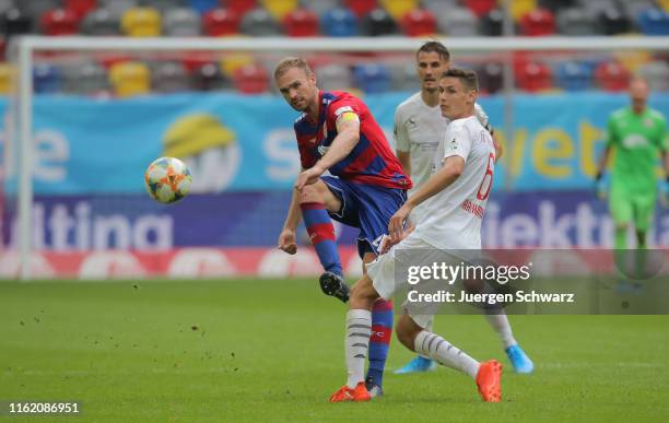 Jan Kirchhoff of Uerdingen and Maximilian Thalhammer of Ingolstadt compete during the 3. Liga match between KFC Uerdingen and FC Ingolstadt at Merkur...