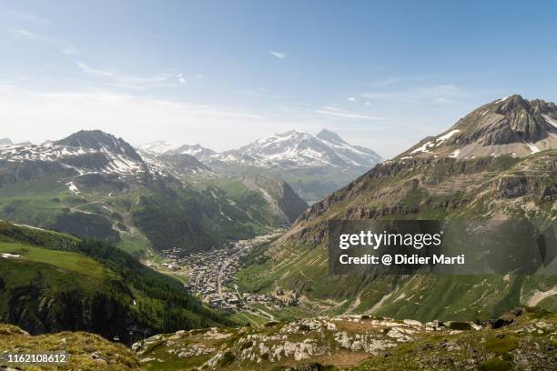 view of the val d'iser village in the french alps - french alps summer stock pictures, royalty-free photos & images