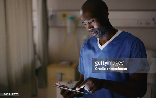 integrating the modern and medical worlds - nurse working stock pictures, royalty-free photos & images