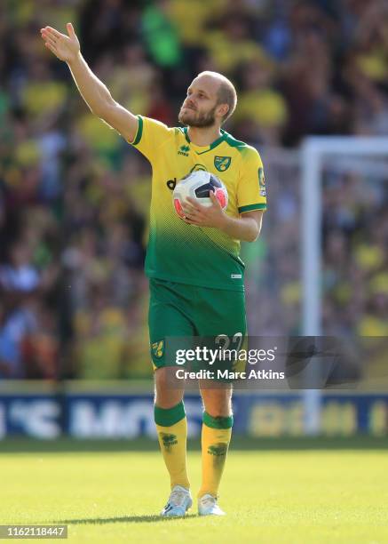 Teemu Pukki of Norwich City celebrates with the match ball after his hat trick during the Premier League match between Norwich City and Newcastle...