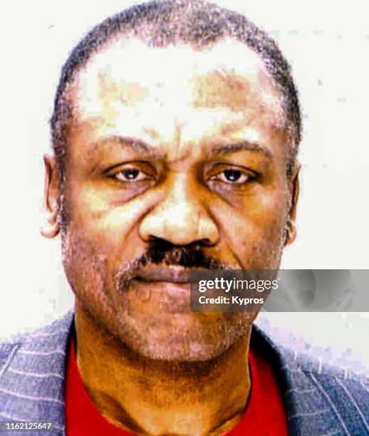 In this handout, American boxer Joe Frazier in a mug shot, Philadelphia, US, February 2004.