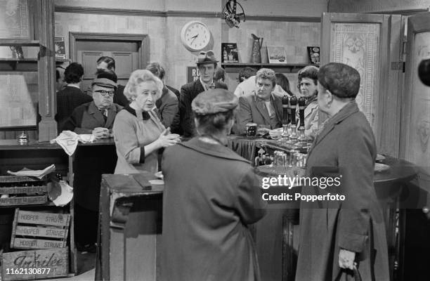 From left, English actors Jack Howarth as 'Albert Tatlock', Doris Speed as 'Annie Walker', Peter Adamson as 'Len Fairclough' and Pat Phoenix as Elsie...