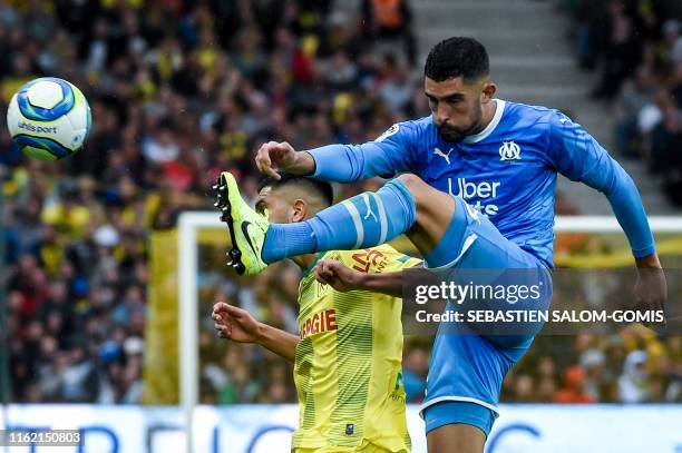 Marseille's Spanish defender Alvaro Gonzales jumps to control the ball during the French L1 football match between FC Nantes and Olympique de...