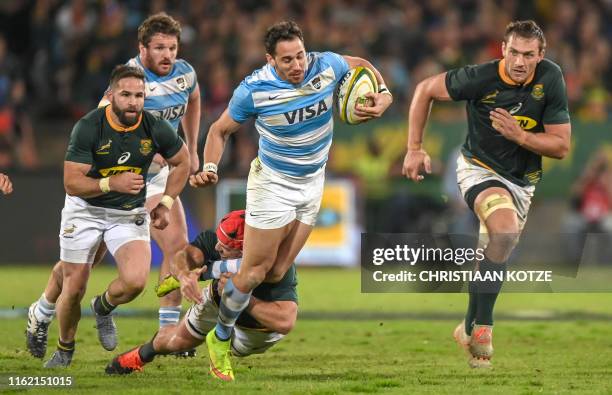 Argentina center Joaquin Tuculet is tackled by South Africa Captain and hooker Schalk Brits during their 2019 Rugby Union World Cup warm-up test...