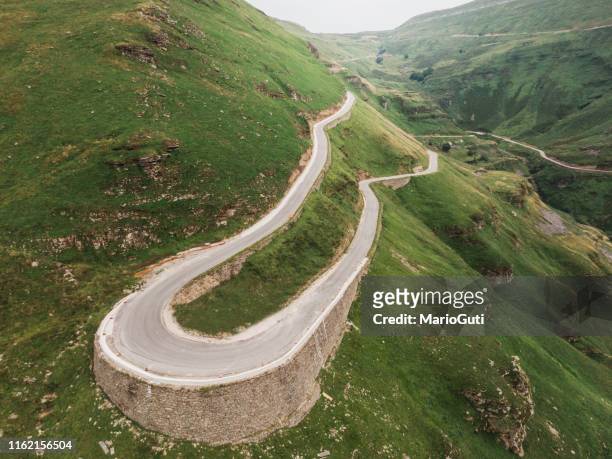 mountain road - hairpin curve stock pictures, royalty-free photos & images