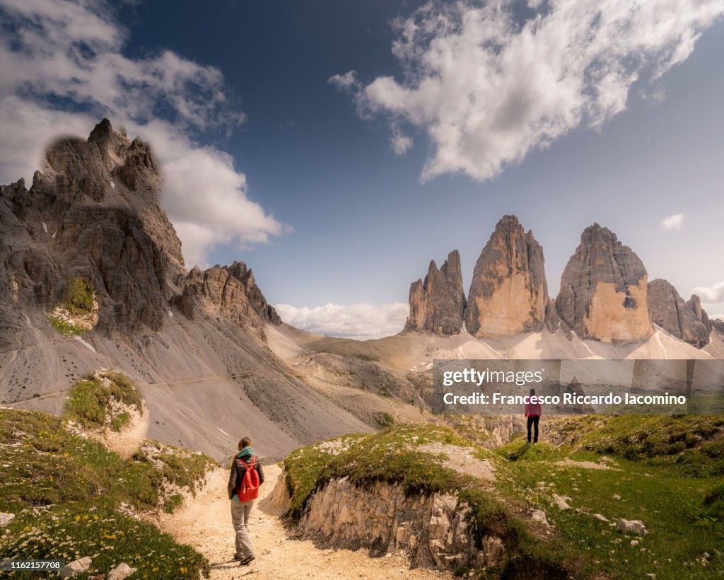 Two women hiking at Tre Cime di Lavaredo, Dolomites Alps, Italy