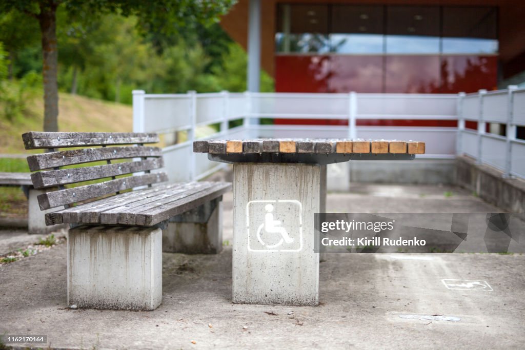 A motorist's rest stop equipped with a picnic spot for disabled