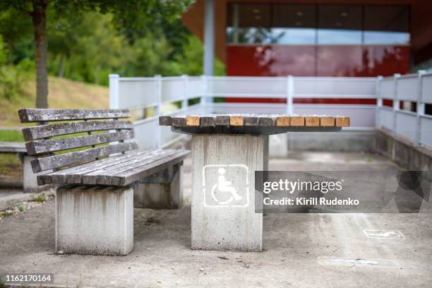 a motorist's rest stop equipped with a picnic spot for disabled - rest area sign stock pictures, royalty-free photos & images