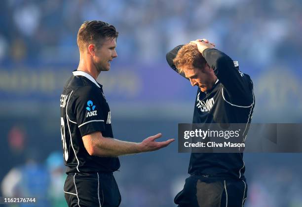 Jimmy Neesham of New Zealand and Martin Guptill of New Zealand react to their loss after the Final of the ICC Cricket World Cup 2019 between New...