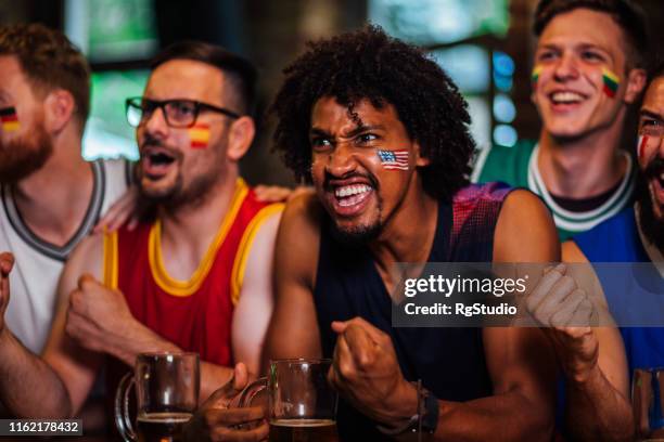 men watching basketball - basketball league stock pictures, royalty-free photos & images