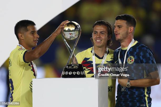 Victor Rodriguez touches the trophy after winning the match between Club America and Tigres UANL as part of the Campeon de Campeones Cup at Dignity...