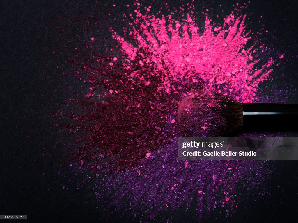 Make-Up Brush Amidst Explosion of Eyeshadow Colors