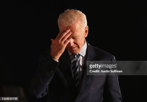 Democratic presidential candidate former U.S. Vice President Joe Biden pauses as he speaks during the AARP and The Des Moines Register Iowa...