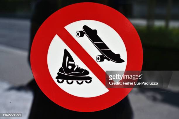forbidden roller skating and skateboarding sign at downtown biel, switzerland - no symbol stock pictures, royalty-free photos & images