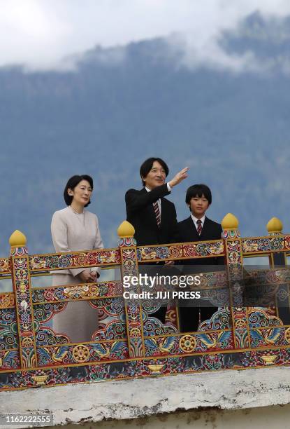 This August 17, 2019 picture shows Japan's Crown Prince Akishino , Crown Princess Kiko and their 12-year-old son, Prince Hisahito , visiting the...
