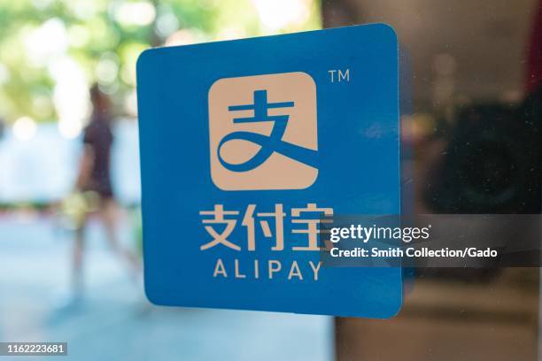 Close-up of logo for Alipay in a retail environment, the payment processing service of Chinese internet conglomerate Alibaba, in the Silicon Valley,...