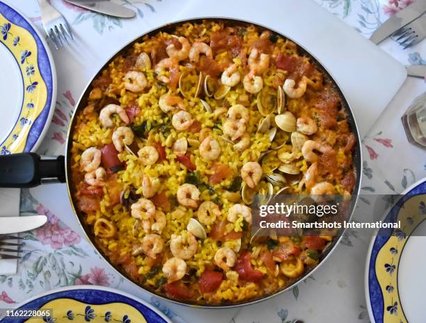 homemade seafood paella - valencia spain stock pictures, royalty-free photos & images