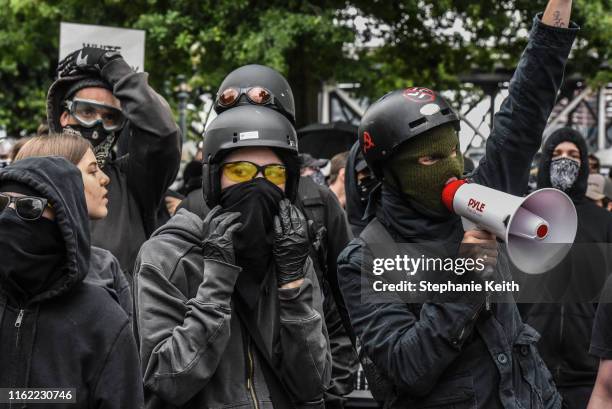 Counter-protesters wear black clothes during an Antifa gathering during an alt-right rally on August 17, 2019 in Portland, Oregon. Anti-fascism...