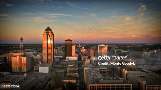 aerial photo of downtown des moines from southwest at sunset - iowa stock pictures, royalty-free photos & images