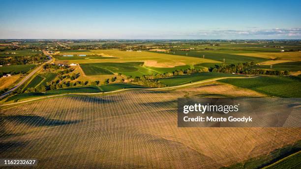 aerial view of midwestern green landscape - iowa farm stock pictures, royalty-free photos & images