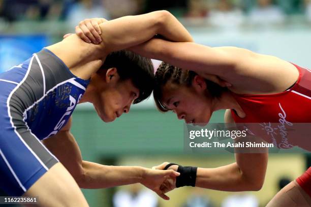 Risako Kawai and Kaori Icho compete in the Women's 57kg final on day four of the All Japan Wrestling Invitational Championships at Komazawa Gymnasium...