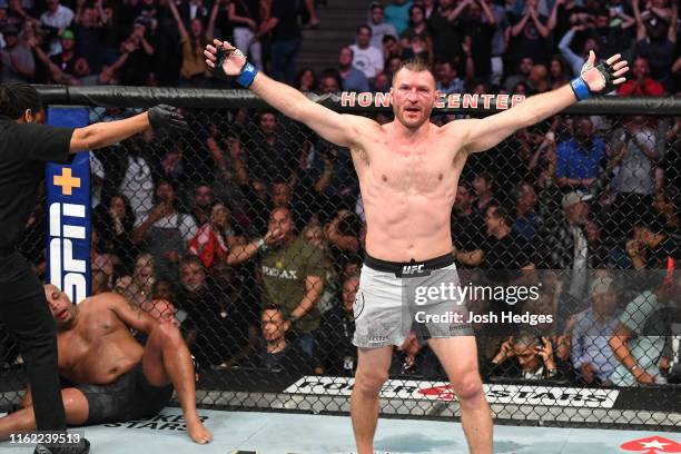 Stipe Miocic celebrates his TKO victory over Daniel Cormier in their heavyweight championship bout during the UFC 241 event at the Honda Center on...