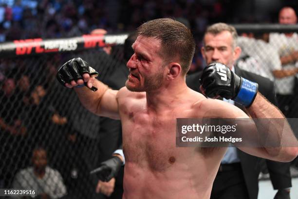 Stipe Miocic celebrates his TKO victory over Daniel Cormier in their heavyweight championship bout during the UFC 241 event at the Honda Center on...