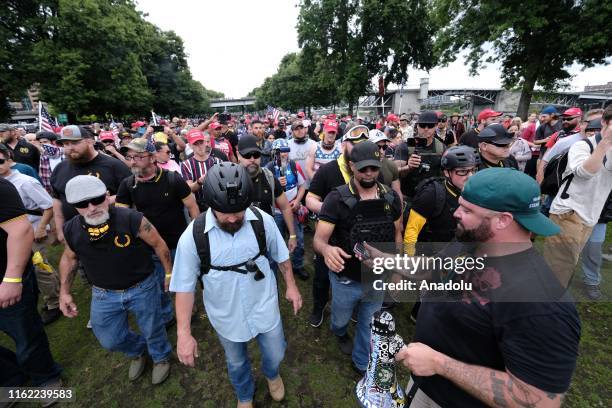 Proud Boys walk along the waterfront in Portland, Oregon, United States, during a demonstration organized by Joe Biggs calling for an end to domestic...