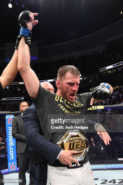 Stipe Miocic celebrates his TKO victory over Daniel Cormier in their heavyweight championship bout during the UFC 241 event at the Honda Center on...