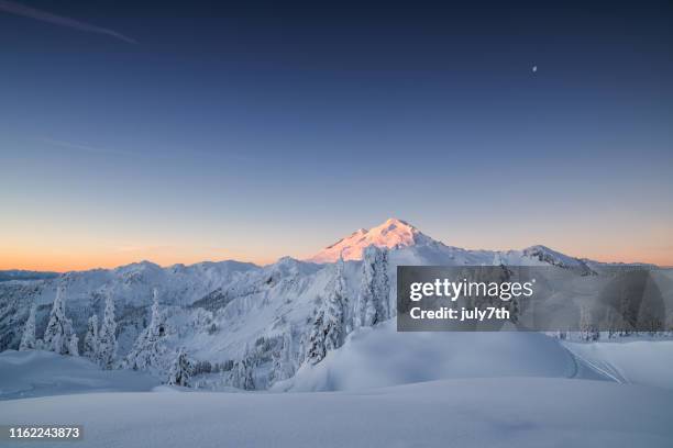 winter dawn on mountain baker - winter panoramic stock pictures, royalty-free photos & images