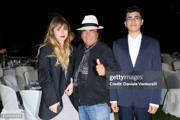 Yasmine Carrisi , Al Bano Carrisi and Albano Carrisi Jr. Attend 2019 Ischia Global Film & Music Fest on July 15, 2019 in Ischia, Italy.