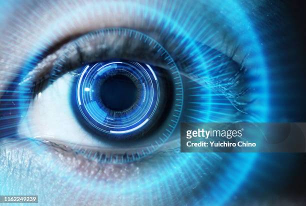 human eye with using the futuristic technology - augen verbunden stock-fotos und bilder