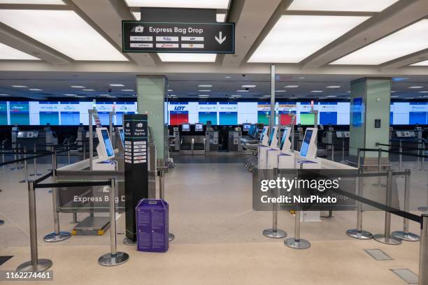 Check-in counter desks. Interior of London City Airport LCY EGLC, located in the Royal Docks in Borough of Newham, Silvertown near the City of London...