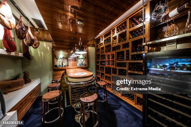temperature and moisture regulated degustation room in a wine cellar of a luxurious yachting themed restaurant - wine cellar stock pictures, royalty-free photos & images