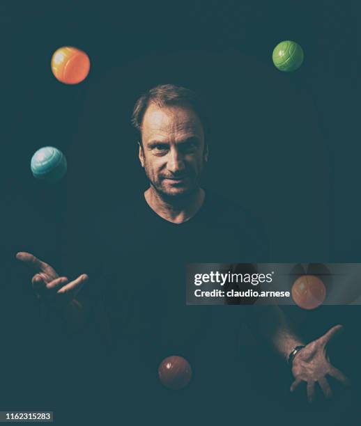 juggler - juggling stock pictures, royalty-free photos & images