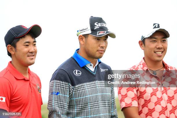 Takumi Kanaya, Hideki Matsuyama and Mikumu Horikawa of Japan pose for photos during a practice round prior to the 148th Open Championship held on the...