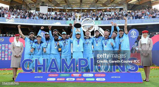 Eoin Morgan of England lifts the Cricket World Cup Trophy during the Final of the ICC Cricket World Cup 2019 between New Zealand and England at...