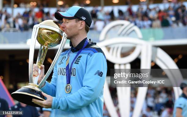 Eoin Morgan of England lifts the Cricket World Cup Trophy during the Final of the ICC Cricket World Cup 2019 between New Zealand and England at...